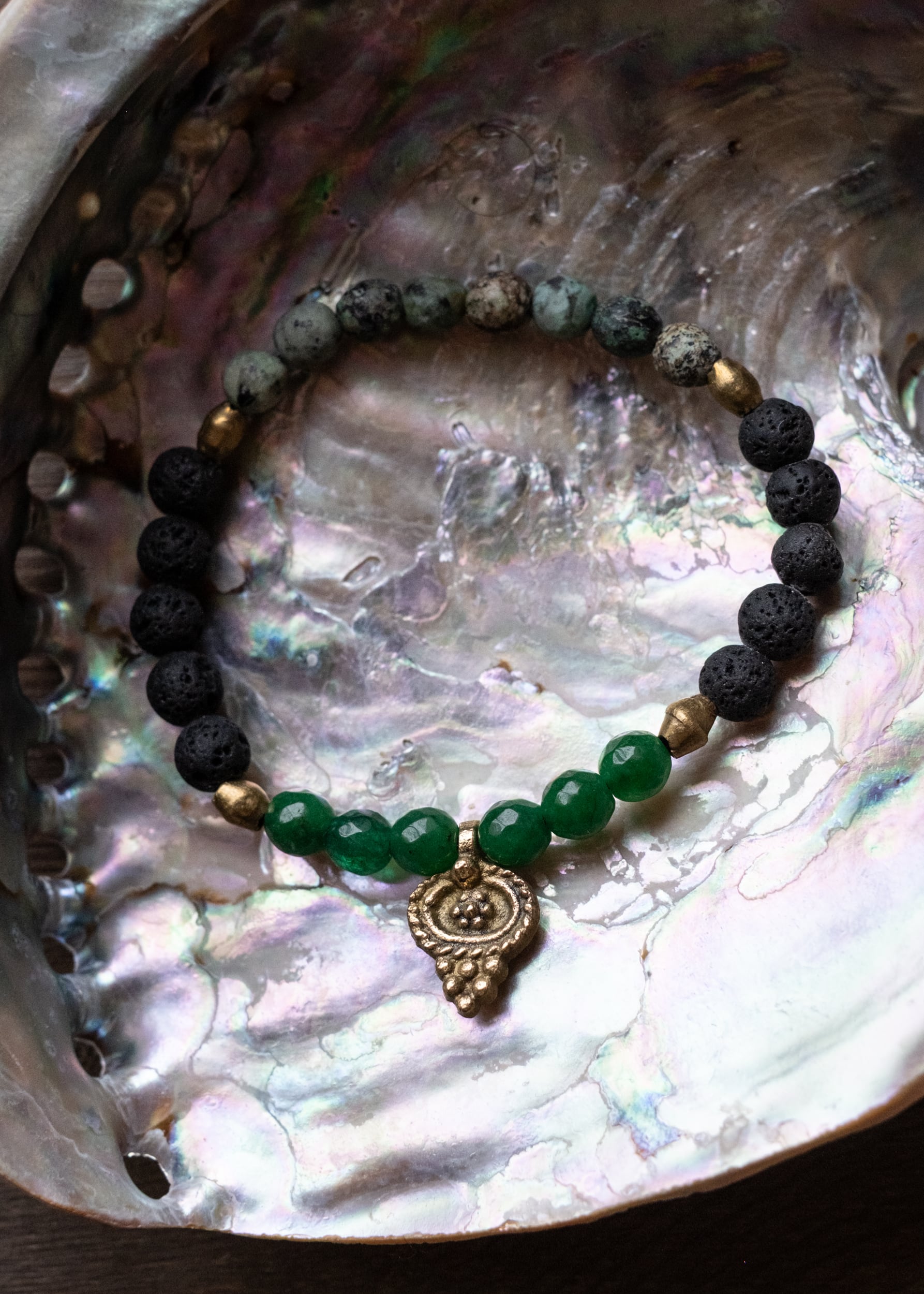 Emerald Glow Lava Stone Bracelet with Brass Talisman