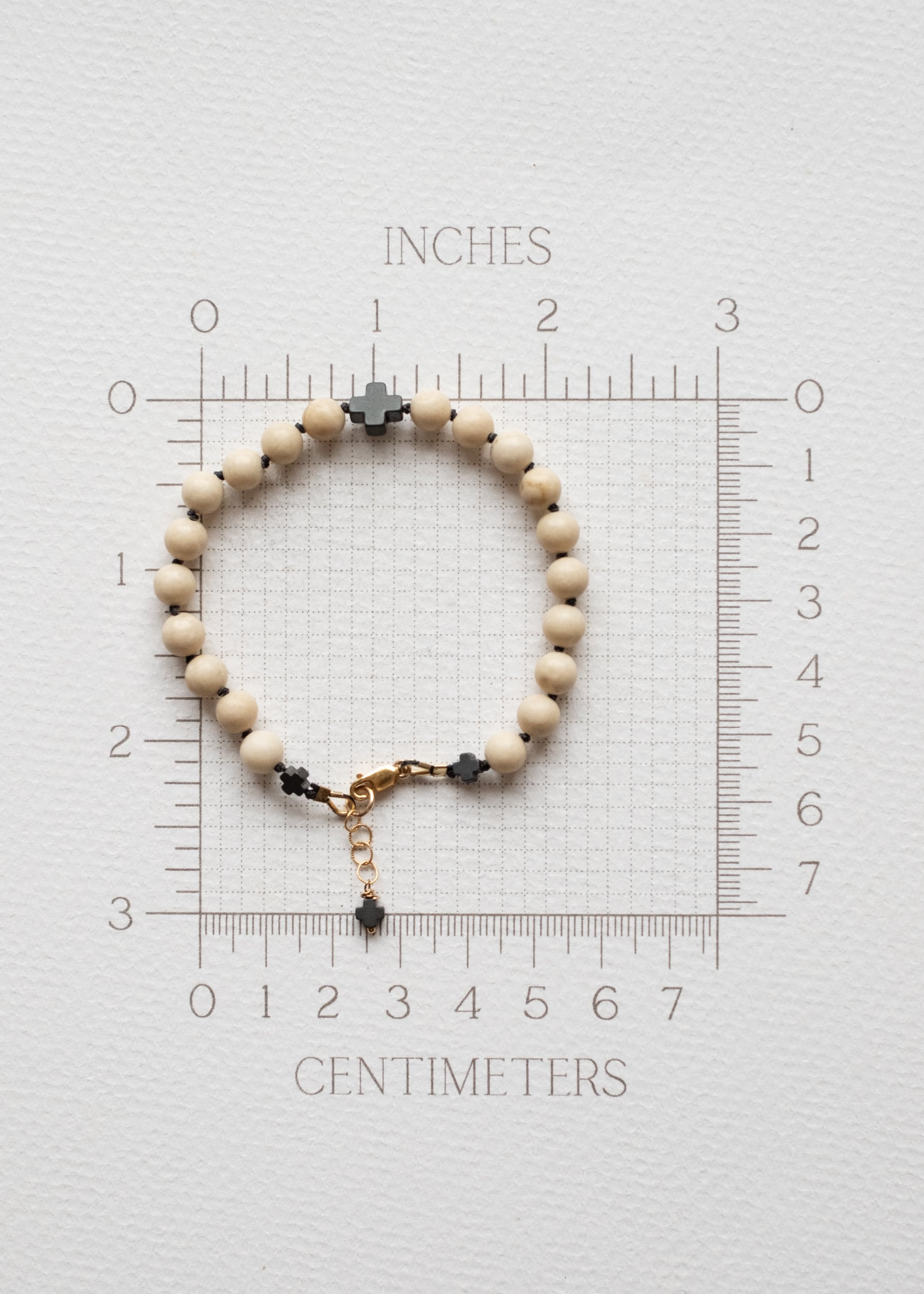 Fossil and Hematite Cross Bracelet by Atelier 363, photo e