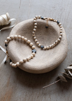 Fossil and Hematite Cross Bracelet by Atelier 363, photo a