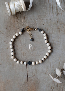 Fossil and Hematite Cross Bracelet by Atelier 363, photo c