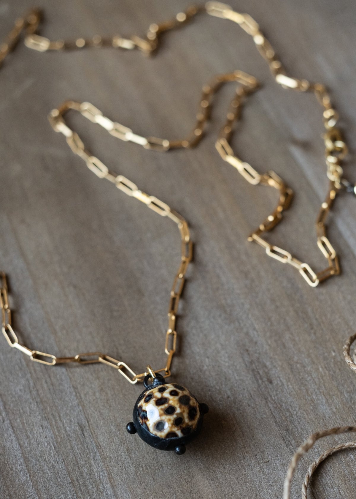 Speckled Sphere Pendant Necklace by Atelier 363, photo a