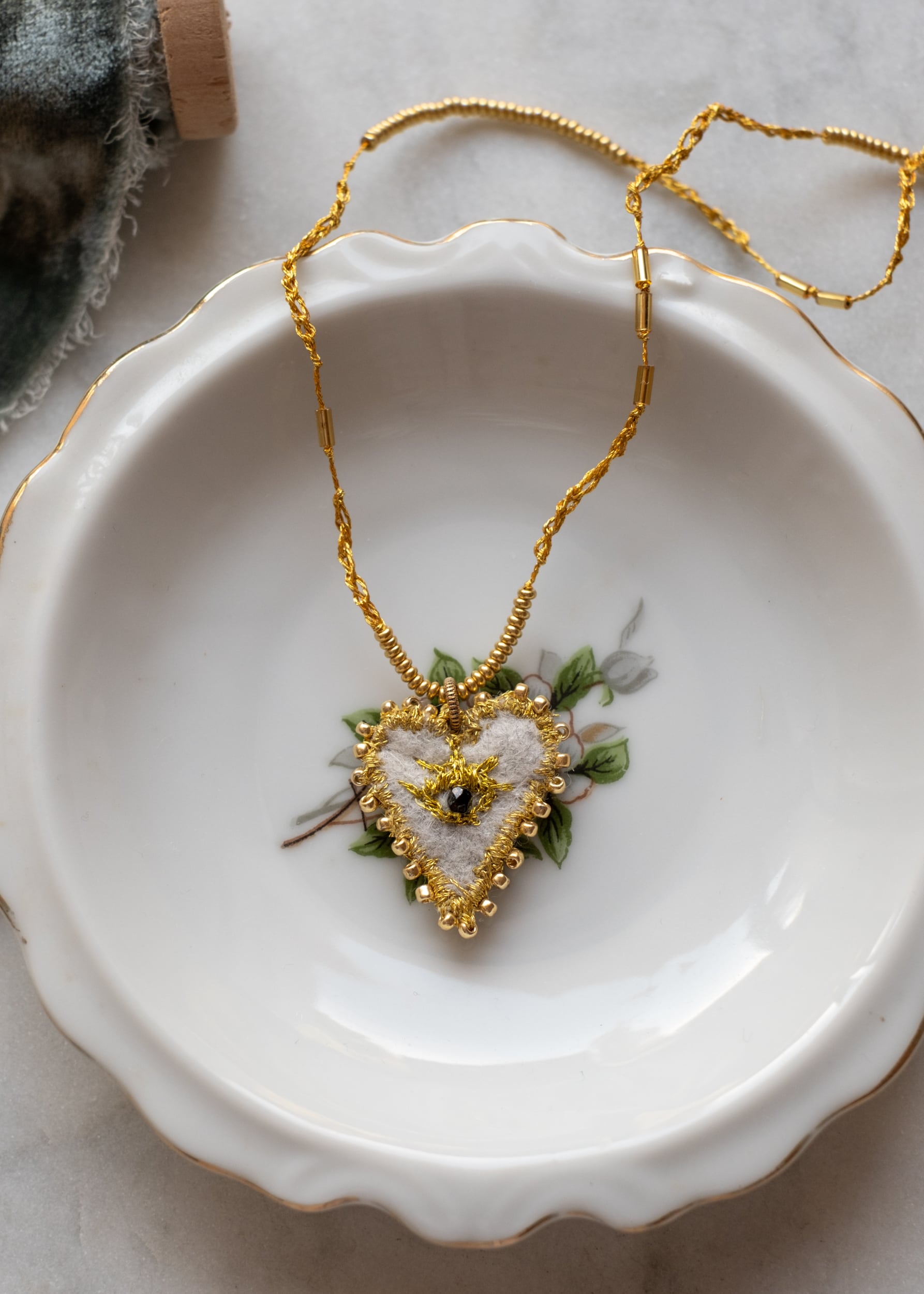 Golden Eye Felt Heart Necklace by Atelier 363, photo a
