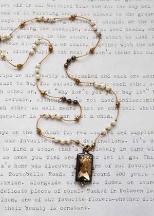 Golden Light Glass Pendant Necklace